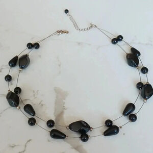 Floating bead black necklace